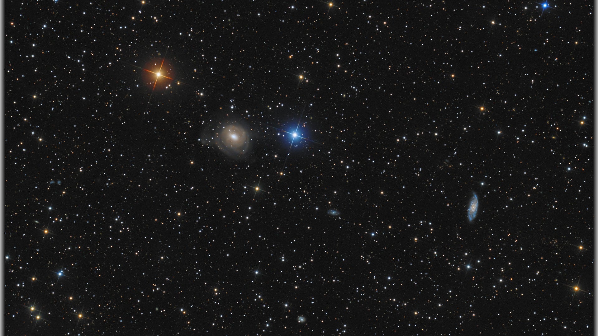 NGC 2655, NGC 2715 & NGC 2653 Spektrum der Wissenschaft